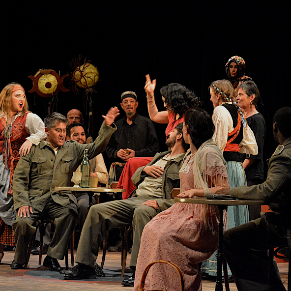 Singers on stage performing the opera Carmen