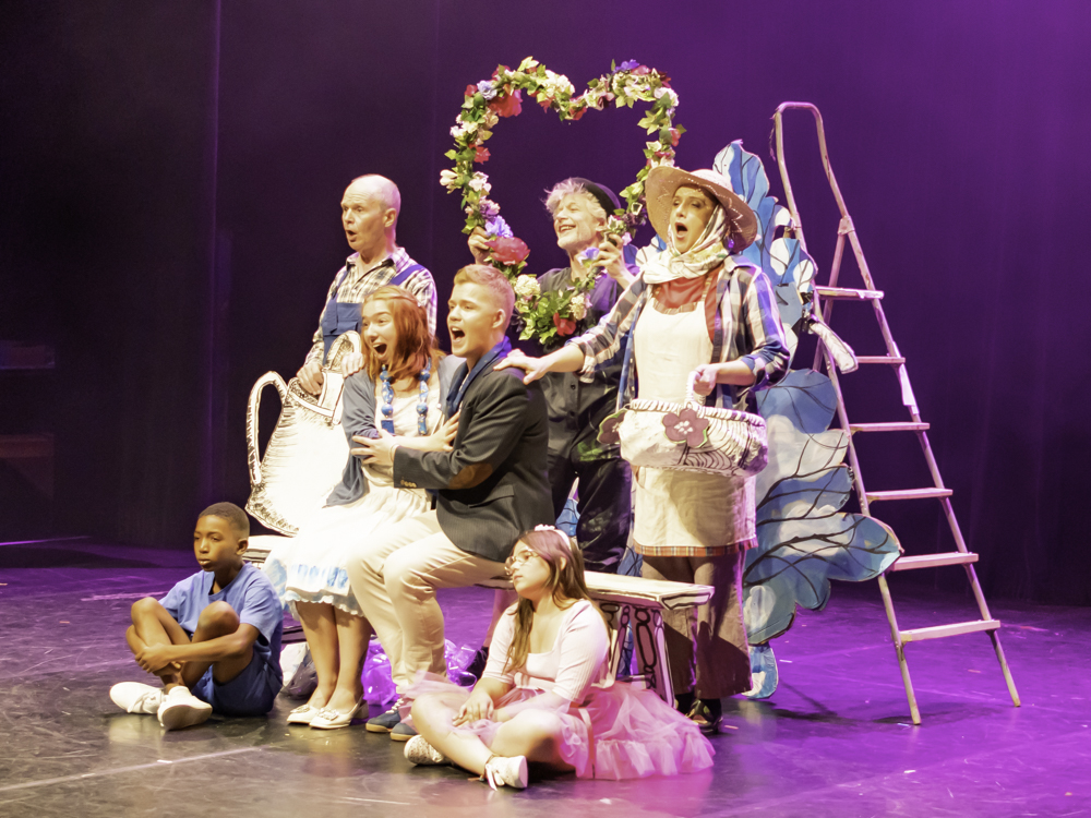Singers on stage performing in The Fantasticks